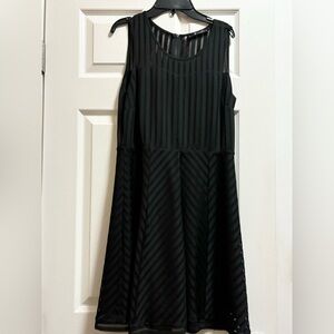 Neesha black sheer dress.